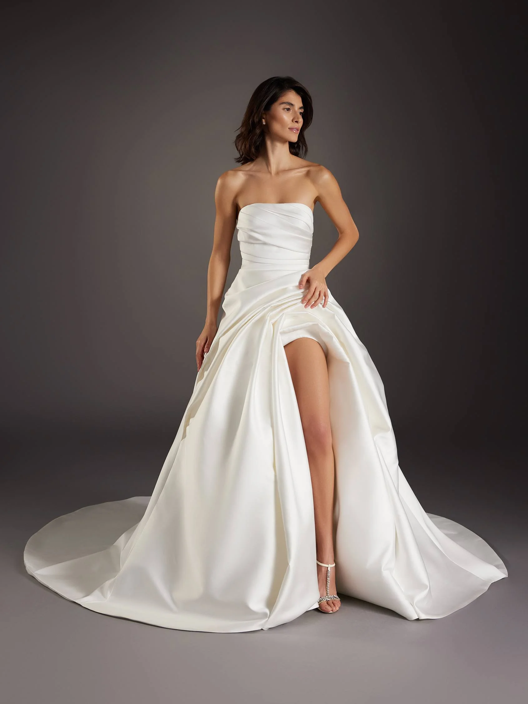 MODERNISMO Princess wedding dress with long sleeves and an asymmetrical neckline in Mikado 1 MODERNISMO Princess wedding dress with long sleeves and an asymmetrical neckline in Mikado