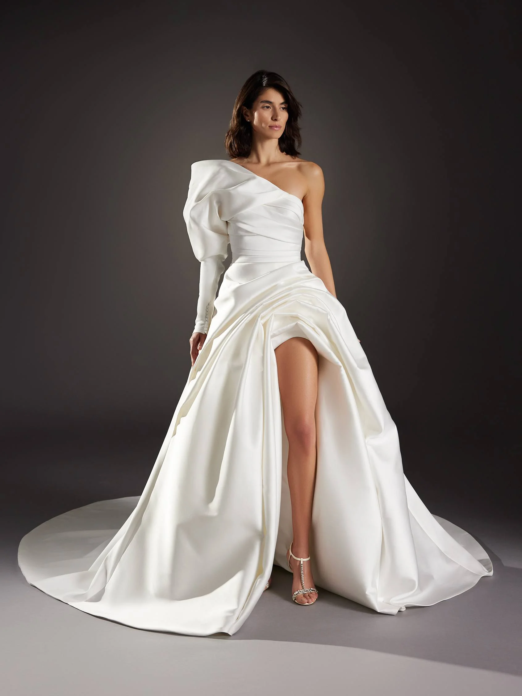 MODERNISMO Princess wedding dress with long sleeves and an asymmetrical neckline in Mikado 2 MODERNISMO Princess wedding dress with long sleeves and an asymmetrical neckline in Mikado