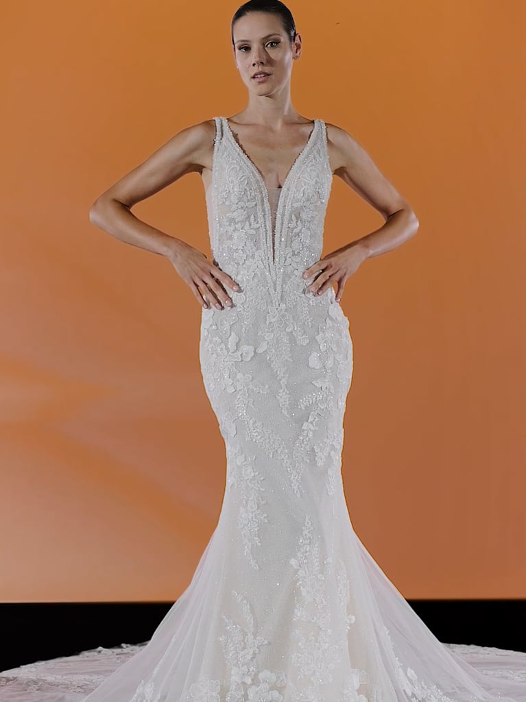 ASMIN Mermaid wedding dress with a V-neckline and sheer details on the back 1 ASMIN Mermaid wedding dress with a V-neckline and sheer details on the back