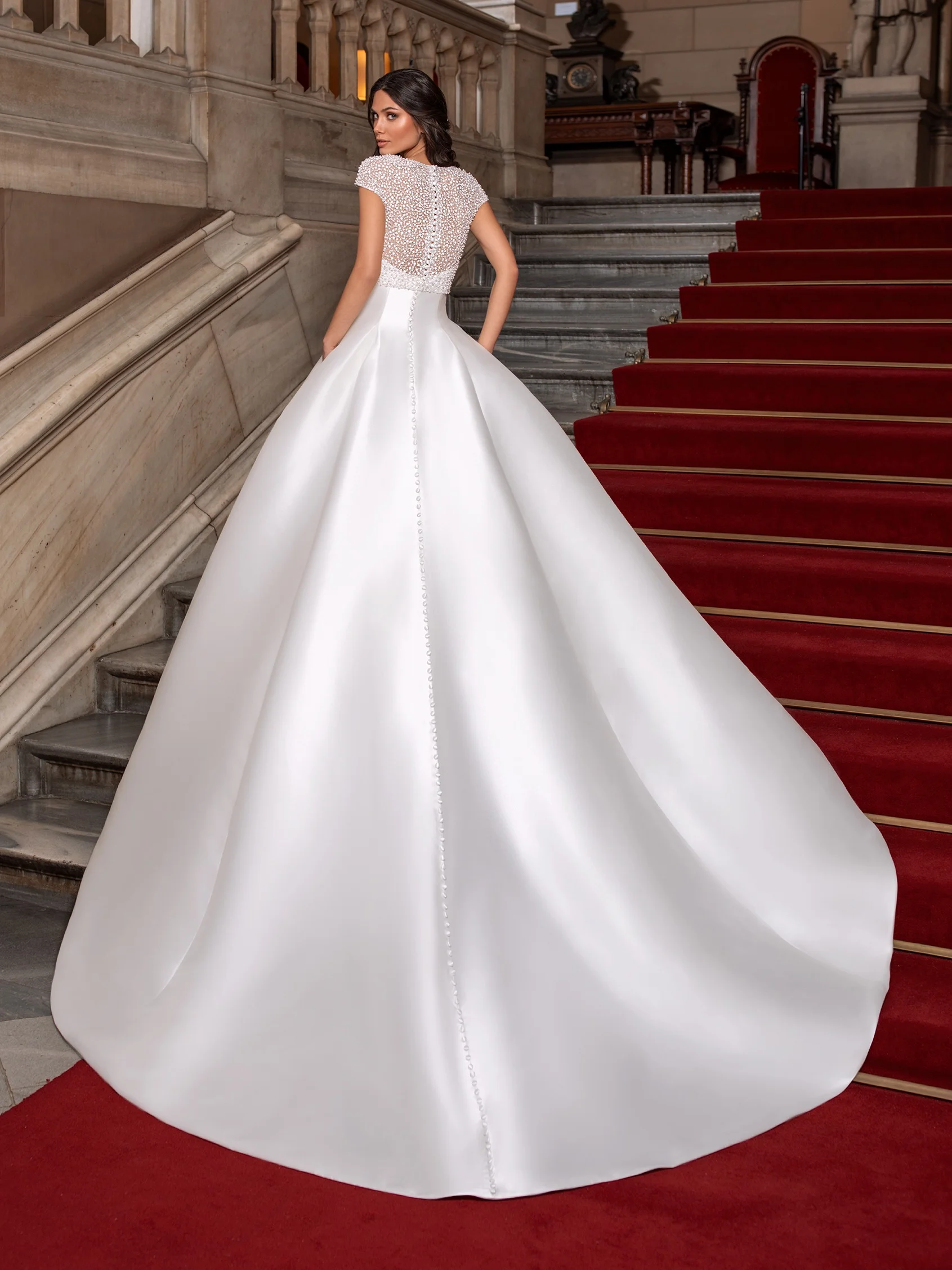 CLOSE Princess wedding dress in mikado with sweetheart neckline, short sleeves and open back 3 CLOSE Princess wedding dress in mikado with sweetheart neckline, short sleeves and open back